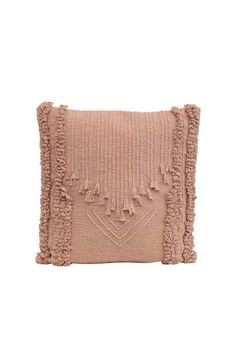 a pink pillow with fringes on it