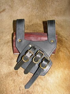 "Double 10oz black bridle leather designed to hold heavy swords. 4\"belt loops" Adjustable Black Harness With Belt, Adjustable Leather Harness With Belt, Black Gothic Leather Harness, Leather Harness With Straps, Black Leather Harness With Belt Included, Black Leather Harness With Belt, Leather Strapped Harness With Belt, Gothic Leather Harness With Belt, Brass Buckle