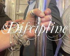 two people on a train with bracelets and rings