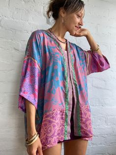 Colourfull light silky shirt perfect for hot summer days and nights out,  patchwork made of scrap silk material  made for both men and ladies, unisex kimono shirt  great ovrsized over all  loose fit, easy to wear  one and only kind  plus size more available at  https://www.etsy.com/shop/AltheaStores? Thank You for looking Summer Multicolor Kimono One Size, Patchwork Kimono For Summer Festivals, Summer Festival Patchwork Kimono, Pink Long Sleeve Kimono With Patchwork, Casual Multicolor One-size Kimono, Multicolor Cotton Patchwork Kimono, Hippie Style Multicolor V-neck Kimono, Kimono Shirt, Patchwork Shorts