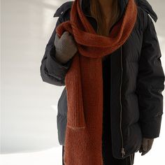 "The wonderfully fluffy Mohair ribbed SCARF is hand knitted from soft and warm KID mohair, silk and MERINO wool blend. Chunky knit, still light classic winter hat weight to elevate any outfit, so you can pair it with an oversized coat or your bomber jacket. Whether casually  wrapped around your neck or thrown over the shoulders, this extra long scarf strikes the perfect balance between warmth and softness. Both light and fuzzy, this extra soft SCARF has a fold-over brim for extra warmth. Spend t Hand Knitted Mohair Scarf For Winter, Hand-knitted Mohair Scarf For Winter, Hand Knitted Scarf, Linen Slip Dress, Wide Leg Linen Trousers, Mohair Scarf, Ribbed Scarf, Linen Tunic Dress, Orange Scarf