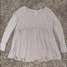 Super Cute And Cozy Free People Babydoll Tunic. Never Been Worn Size Small. Very Soft Cute Long Sleeve Tops For Daywear, Cute Long Sleeve Sleep Tops, Cute Spring Sleep Tops, Cute Gray Long Sleeve Top, Free People Tops, Tunics, Baby Dolls, Tunic Tops, Free People