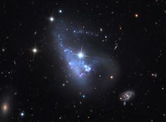 an image of a spiral galaxy in the night sky