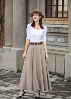 "Get dressed and out of the door in classic good looks with this pleated Long maxi skirt, crafted with soft cotton linen fabric, featuring pleated waist detail and two big pockets. DETAIL * More color https://etsy.me/3fsncV4 * 50% linen, 50% cotton * Has no lining, Not see through * Two pockets * High waistband * Back elastic waistband * Right Side zipper closure * Ankle length * Perfect for spring and summer, autumn * Wash by hand or machine with cold water *The model is 170 cm (5′7″) tall with High Waist Maxi Skirt, Long Linen Skirt, Midi Skirt With Pockets, High Waisted Maxi Skirt, Khaki Skirt, Pleated Long Skirt, Women Skirt, Big Pockets, Wool Clothing