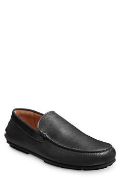 A streamlined silhouette and squared-off moc toe bring timeless sophistication to a leather loafer grounded by a cushioned footbed and rubber driving sole. Cushioned footbed with arch support Leather upper and lining/synthetic sole Imported Driving Slip-ons With Leather Sole, Slip-on Moc Toe Driving Loafers, Slip-on Moc Toe Loafers For Driving, Moc Toe Driving Loafers With Leather Sole, Classic Moc Toe Driving Loafers, Black Leather Sole Driving Moccasins, Classic Moc Toe Loafers For Driving, Driving Loafers With Leather Sole And Plain Toe, Elegant Driving Loafers With Moc Toe