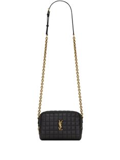 Introducing the mini Cassandre Carré Camera Handbag by Saint Laurent Crafted in quilted lambskin with a matelassé grid pattern Chic and easy-going statement of timeless elegance Smooth black hue enhanced by gold-tone hardware Features a characteristic YSL logo plaque and signature chain-link detailing Practical and stylish with a top zip fastening and internal logo patch for small essentials Perfect for day or evening affairs alike Gorgeous for the 2024 FW23 season Ysl Lou Camera Bag Black, Planet People, Leather Cap, Mini Quilt, Mua Sắm, Handbag Backpack, Mens Shoes Sneakers, Handbag Accessories, Small Bags