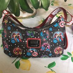 Great Gift For The Marvel Fan! Small But Fits Most Phones And A Little Room To Spare! Iron Man, Thor. Captain America! Take It To Your Next Trip To Disneyland Or Disney World! No Trades! Iron Man Thor Captain America, Alice In Wonderland Bag, Michael Kors Handbags Black, Trip To Disneyland, Disney Loungefly, Fringe Handbags, Disney Bags, Uniqlo Bags, Vintage Chanel Handbags