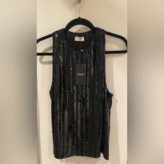 Saint Laurent Black Silk Sequin Sleeveless Blouse. New With Tags. Size 40 (France) Equivalent To A Us M/Us 8. 100% Silk. Originally $3,190. Black Silk, Sleeveless Blouse, Saint Laurent, Sequin, The 100, Top Blouse, Womens Tops, France, Silk