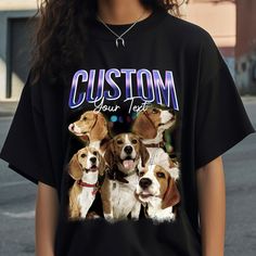 a woman wearing a custom t - shirt with four dogs on it