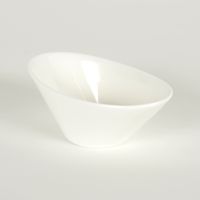 a white bowl sitting on top of a table