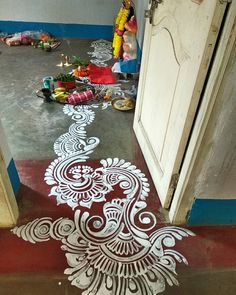 an intricately painted floor in the middle of a room