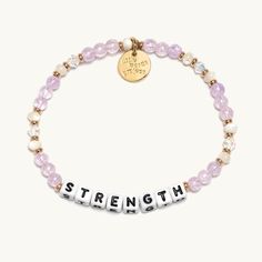 When you need a little nudge of strength, look down and have this wearable reminder that you can handle anything that comes your way. Fits up to 6.25" wrist comfortably Hand-crafted, crystal beaded bracelet Acrylic letter beads Plated brass hardware Elastic stretch bracelet Handle with care - do not wet Little Words Project, Strength Bracelet, Letter Bead Bracelets, Hair Socks, Trending Bracelets, 17th Birthday, Scarf Sale, Crystal Beads Bracelet, Glass Bracelet