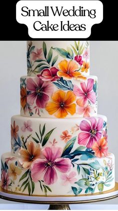 a wedding cake with flowers painted on it and the words, small wedding cake ideas