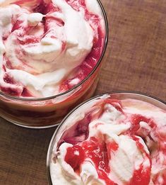 two desserts with whipped cream and jelly in them