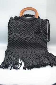 Elevate your style with this stunning Danielle Nicole Black Macrame Handbag. Crafted from high-quality polyester, this solid crossbody bag is perfect for women who love to make a statement. The brand, known for their exceptional quality, has created a unique piece that is sure to turn heads. Featuring a cross-body strap, this bag is not only stylish but also functional. It's perfect for carrying all your essentials, whether you're out running errands or hitting the town with friends. With its sleek black exterior, this handbag is versatile enough to pair with any outfit. Upgrade your wardrobe with this must-have accessory today. Macrame Handbag, Outfit Upgrade, Black Macrame, Danielle Nicole, Black Exterior, Running Errands, Cross Body, Carry On, Unique Pieces