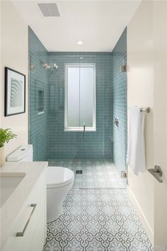 bathroom remodel ideas on a budget Small Shower Room Tiling Ideas, Light Blue Green Bathroom, Colorful Shower Tile Ideas, Printed Tile Bathroom, White And Wood Bathroom, Greek Bathroom, Long Narrow Bathroom, Modern Boho Bathroom, Bathroom Redesign