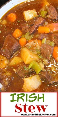 irish stew with carrots, potatoes and celery in a white bowl