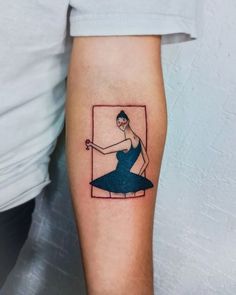 a woman's arm with a tattoo on it that has an image of a ballerina