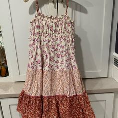 Cotton Floral Print Sundress Size Medium. The Same Dress Maggie Grace Wore In The Film Taken. Multiple Floral Prints Stitched Together. Fitted Bodice With Flowing Skirt. Straps Are Attached With Buttons So It Can Also Be Worn Strapless. It Came With A Red Sash But I Never Used It And No Longer Have It. You Can See It In The First Picture. Forever 21 Sleeveless Beach Sundress, Sleeveless Forever 21 Sundress For The Beach, Forever 21 Pink Vacation Dress, Forever 21 Floral Print Maxi Dress, Forever 21 Sleeveless Maxi Dress For Beach, Forever 21 Sleeveless Sundress Maxi Dress, Sleeveless Maxi Dress By Forever 21 For Beach, Red Floral Print Sundress For Casual Wear, Forever 21 Floral Print Midi Dress