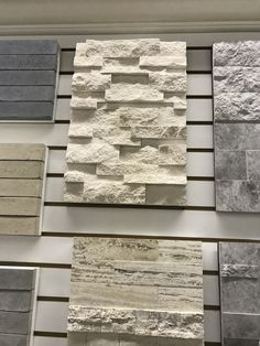 several different types of stone tiles on display