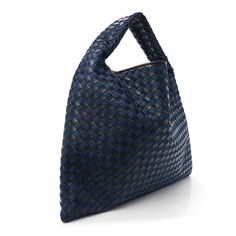 This is an authentic BOTTEGA VENETA Denim Nappa Intrecciato Large Hop in Abyss and Indigo. This is a beautiful hobo, crafted of woven lambskin leather and denim, with an incorporated looping shoulder strap. The gold top zipper opens to an interior of smooth denim leather. Bottega Veneta Hobo Bag, Leather And Denim, Triangle Bag, Basket Tote, Small Basket, Bottega Veneta Bags, Mini Pouches, Gold Top, Purple Bags