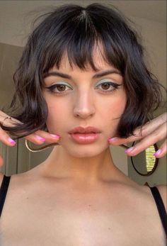 15 Best Curtain Bangs on Short Hair - How To Style It in 2024 French Bob For Thick Wavy Hair, Short Wavy Bob Undercut, Short Wavy Hair 2023, Short Bob Short Fringe, Short Bob With Bangs Wavy Hair, French Bob Mullet, Black French Bob With Bangs, Short Hair Turtleneck, Heavy Bangs Bob