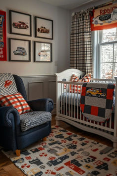 a baby's room with a chair, crib and pictures on the wall