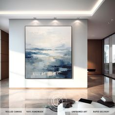 a large painting hanging on the wall in a living room