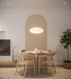 a dining room table with chairs and a round light fixture hanging over it's head