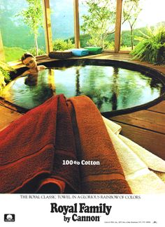 an advertisement for the royal family by cannon shows a woman in a hot tub surrounded by trees