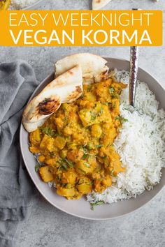 a white plate topped with rice and curry