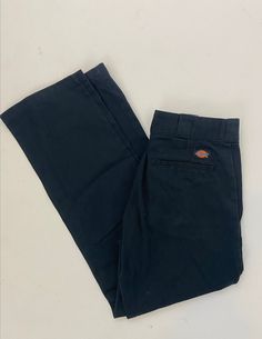 Classic 874 Original Fit Dickies in great vintage condition. Navy Blue Measurements laid flat: Waist- 14" Hip- 17" Waist to Hem- 38" Rise- 10" Inseam- 29" Classic Blue Straight Bottoms, Classic Blue Bottoms For Streetwear, Classic Mid-rise Cotton Work Pants, Vintage Blue Mid-rise Pants, Classic Full-length Streetwear Bottoms, Vintage Blue Bottoms With Standard Cut Leg, Classic Full Length Bottoms For Streetwear, Vintage Straight Leg Work Pants For Streetwear, Vintage Straight Relaxed Fit Bottoms