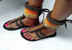 High quality materials Long lasting quality guarantee Superior fit  You look super great with this sandals At the back of the sandals are shoes laces that you tie to your comfortable fit Best for summer outdoor trips and evening wear Very durable and stylish Very beautiful and unique 100% handcrafted using soft leather and fine beads All sizes are available  We ship via DHL express For wholesale please contact us Handmade T-strap Sandals With Toe Post For Vacation, Handmade Black Flip Flops, Handmade Ankle Wrap Sandals For Vacation, Handmade Adjustable Casual Toe Ring Sandals, Handmade Adjustable Toe Ring Sandals, Handmade Adjustable T-strap Sandals For Festival, Handmade Adjustable T-strap Sandals For Vacation, Adjustable Handmade T-strap Sandals For Festival, Adjustable Handmade Black Flip Flops