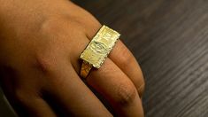 - 100% Brand New & High Quality $100 Dollar Bill Two Finger Ring - Material: 10K Gold - Color: Yellow Gold - Size: 3 ~ 5 ※ As rings are resized into bigger sizes, more gold is added, and thus it makes additional cost. ※ Please send us a message with your desired RING SIZE for both fingers. - Specification(Width / Height / Grams): 29.0mm(1.15 inch) / 12.0mm(0.47 inch) / 3.5g ※ This is an approximate size & weight. Please allow up to ±10% difference. ※ If you have any other resize request, 2 Finger Ring Gold, 5 Gold Rings Costume, 2 Finger Ring, Money For Kids, Money Ring, Two Finger Ring, Money Rings, 100 Dollar Bill, Gold Finger Rings