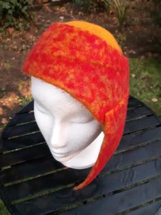 Red and yellow felted wool vintage style hat. Handmade by Estambul Atelier. Materials: 100% natural and organic Merino wool. Adult - one size. **Made to Order** There may be a slight design/ colour variance compared to the images as each piece is hand made to order. Made with the wet felting technique using warm water and pure olive oil soap to blend the natural fibres into a strong and breathable fabric. I recommend hand washing, but can be machine washed using the wool/ delicate setting at a c Vintage Style Hat, Olive Oil Soap, Hat Handmade, Natural Fibres, Wet Felting, Red And Yellow, Felted Wool, Vintage Stil, Natural Fibers