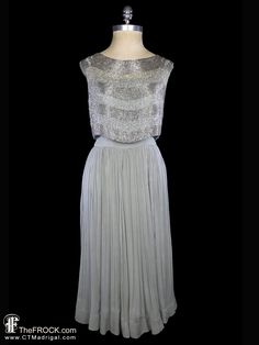 "BIG NEWS After 22 years, our website, TheFROCK.com, has had a makeover. Check out the new site, and join our mailing list for new arrivals.   A major Sally Milgrim vintage Midcentury evening dress in silvery glass bugle beaded silk chiffon. Hidden rear metal zipper entry. Measures bust 35\", waist 27\", length is 45.5\". Condition is excellent. A rare and seriously elegant midcentury masterpiece from one of the most important figures in early American couture.  Layaway is available. ALL DELIVER Silver Sleeveless Evening Dress, Silver Silk Evening Dress For Gala, Glamorous Gray Evening Dress For Party, Silver Embellished Silk Dress, Gray Sequined Evening Dress For Gala, Embellished Silver Silk Dress, Silver Sleeveless Evening Dress For Holiday, Gray Sequin Evening Dress, Gray Sequined Evening Dress For Party