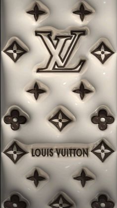 the louis vuitton logo is shown in black and white, with brown accents