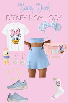 the back of a woman's outfit with disney mouse ears and other items on it