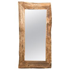 a wooden mirror sitting on top of a white wall