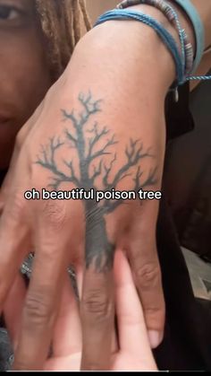 a woman's hand with a tree tattoo on it and the words, an beautiful prison tree