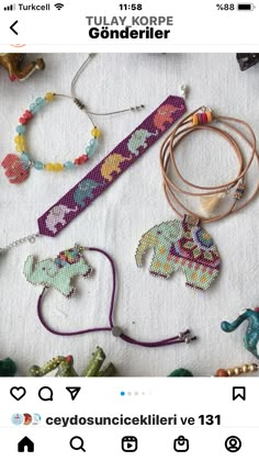 some bracelets and necklaces on a table