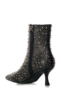 Polished studs create an edgy aesthetic on a bold bootie balanced by a pointy toe and tapered flare heel. Side zip closure Synthetic upper, lining and sole Imported Asian & Pacific Islander Owned/Founded Edgy Aesthetic, Sandal Platform, Plus Size Shopping, Boots And Sneakers, Denim Outfit, Black Fits, Platform Boots, Black Faux Leather, Shoe Sale