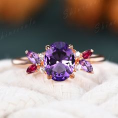 Amethyst ring oval cut Amethyst engagement ring 10k rose gold Feb gemstone art deco cluster ring purple crystal anniversary Gifts This jewelry is made to order, it can be made with any gemstone/metals.  ITEM INFORMATION:  Metal Type: Sterling Silver/14K/18K.  Band Width: About 1.3-1.4mm.  Main Stone: 6x8mm Oval Cut Natural Amethyst.  Side stones: Marquise Cut lab-created ruby and natural amethyst and round cut moissanite OUR SERVICE: √ CUSTOM √ LAYAWAY √ ENGRAVING √ RUSH ORDER READ SHOP RETURN P Amethyst And Diamond Art Deco Ring, Luxury Elegant Three-stone Amethyst Ring, Luxury Oval Amethyst Ring, Art Deco Style, Luxury Oval Amethyst Ring In Art Deco Style, Dark Red Wedding, Amethyst Engagement Ring, Purple Stuff, Mothers Ring, Amethyst Ring Engagement