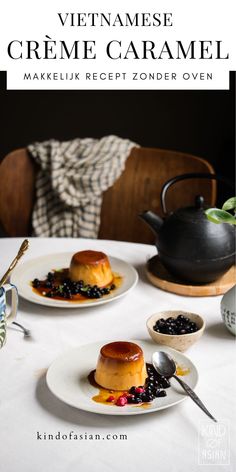 two plates with desserts on them sitting on a table next to a teapot