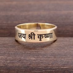 About item Item :- Jai shree krishna Band Ring Ring size :- Chose from variation (Custom size accepted) Material  :- 925 Sterling silver Purity  :- 92.5 Title:- Jai shree  Krishna band  Ring, Mahamantra Holy names, Pure Silver ring, Radhe-Radhe Ring, Radhe Shayam Ring, Meditation Band Yoga Jewelry, Yoga Jewelry,Mom gifts, Women's gift ring, Daughter gift ring Description:- We use 925 sterling silver to making jewelry. We accept all types of custom & personalized order. Please send us a message if you are interested in a custom creation. Shipping profile:- We ship all order within 3-5 days. But custom order takes time. Customer service :- If you have any question about our products & services, feel free to contact us. We do always best for our customers Other Specification:- Please Visit Ou Spiritual Engraved Ring For Anniversary, Symbolic Brass Engraved Ring For Wedding, Spiritual Wedding Rings For Festivals, Spiritual Engraved Wedding Ring, Traditional Rings For Puja And Festivals, Traditional Engraved Wedding Ring, Toe Ring For Puja And Festivals, Spiritual Rings For Festivals Gift, Spiritual Rings As Festival Gifts