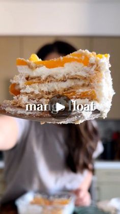 a woman holding up a piece of cake in her hand with the words mar gloati on it