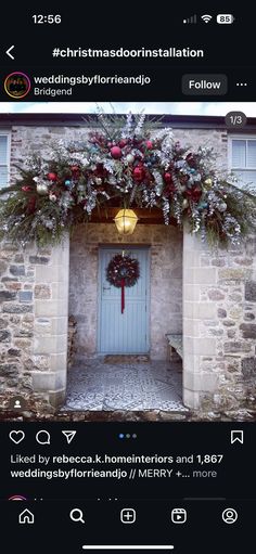 an image of a house decorated for christmas with decorations on the front door and wreath