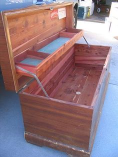 an old wooden chest with its lid open