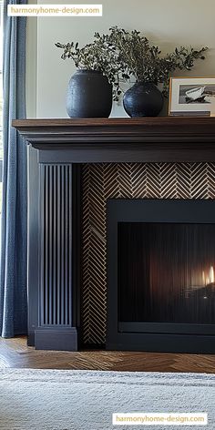 a fireplace with two vases on top of it