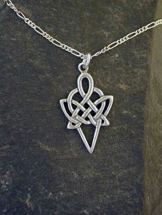 This Celtic Knot Spear Point pendant is Sterling Silver. The included chain is a Sterling Silver Figaro 50 chain. You may choose 16, 18 or 20 inch at the same price. Other length available at sightly higher prices. This Celtic Knot Spear Point pendant measures 1 3/8" long by 3/4" across. I hand cast all my pieces using the lost wax casting method. Please ask your needs. You may call me with questions, often I am out so please use my machine. 831-476-3176. Satisfaction Guaranteed!I send items USP Symbolic Sterling Silver Chain Jewelry, Symbolic Silver Pendant Chain Necklace, 16 Inch Sterling Silver Pendant Chain Necklace, Claw Earrings, Cheap Silver Rings, Necklace Organizer, Trendy Necklaces, Celtic Jewelry, Buying Diamonds